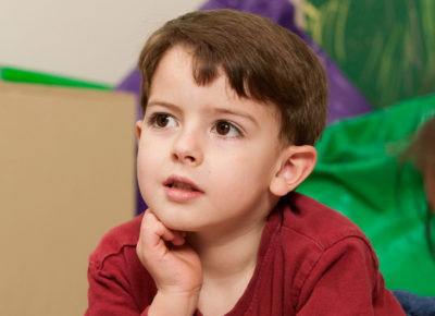 A boy look pensive during a lesson.