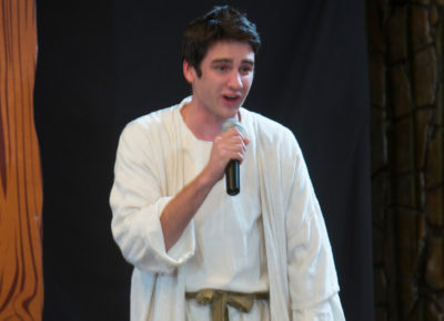 A male volunteer is dressed as Gabriel, the angel that appeared to Mary.