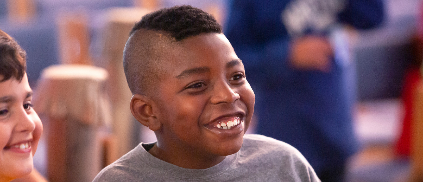 Special Needs Ministry Assisting a Child With Tourette Syndrome