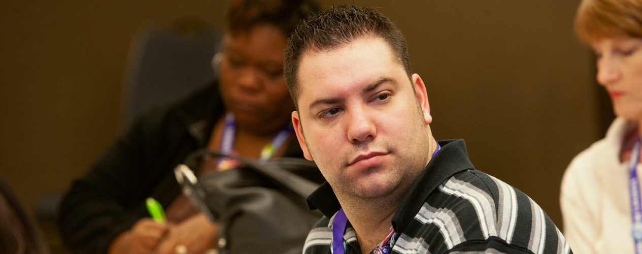 A male volunteer who looks less than pleased.