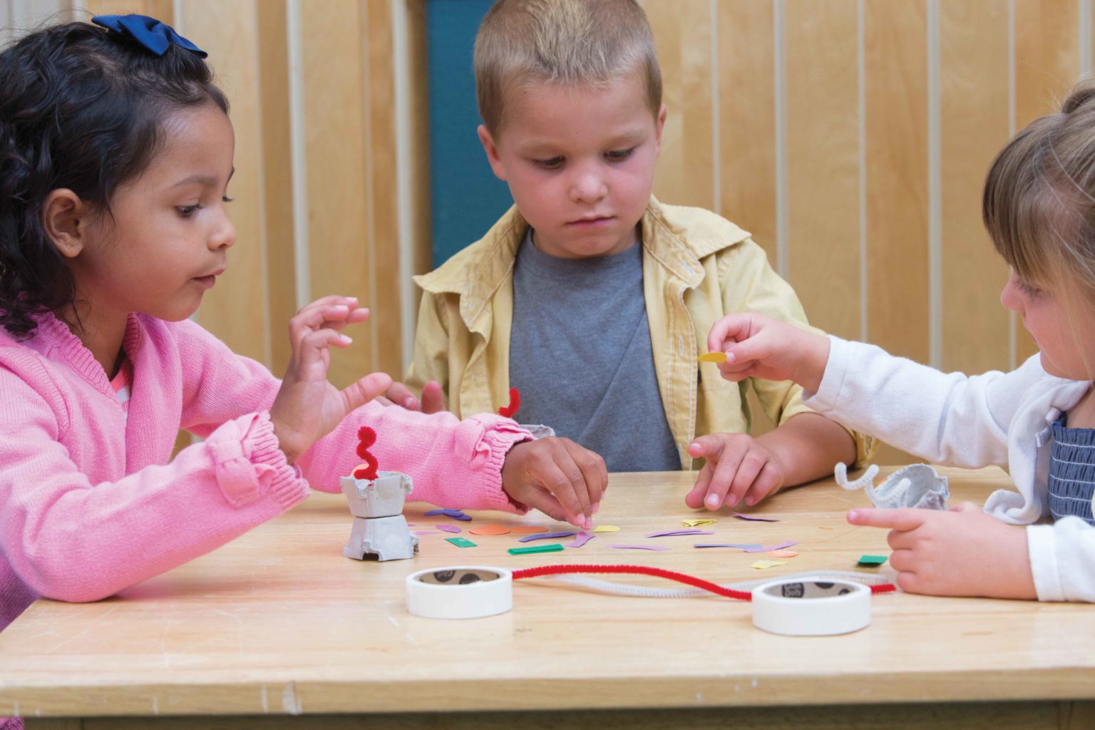 Three preschools building craft robots.