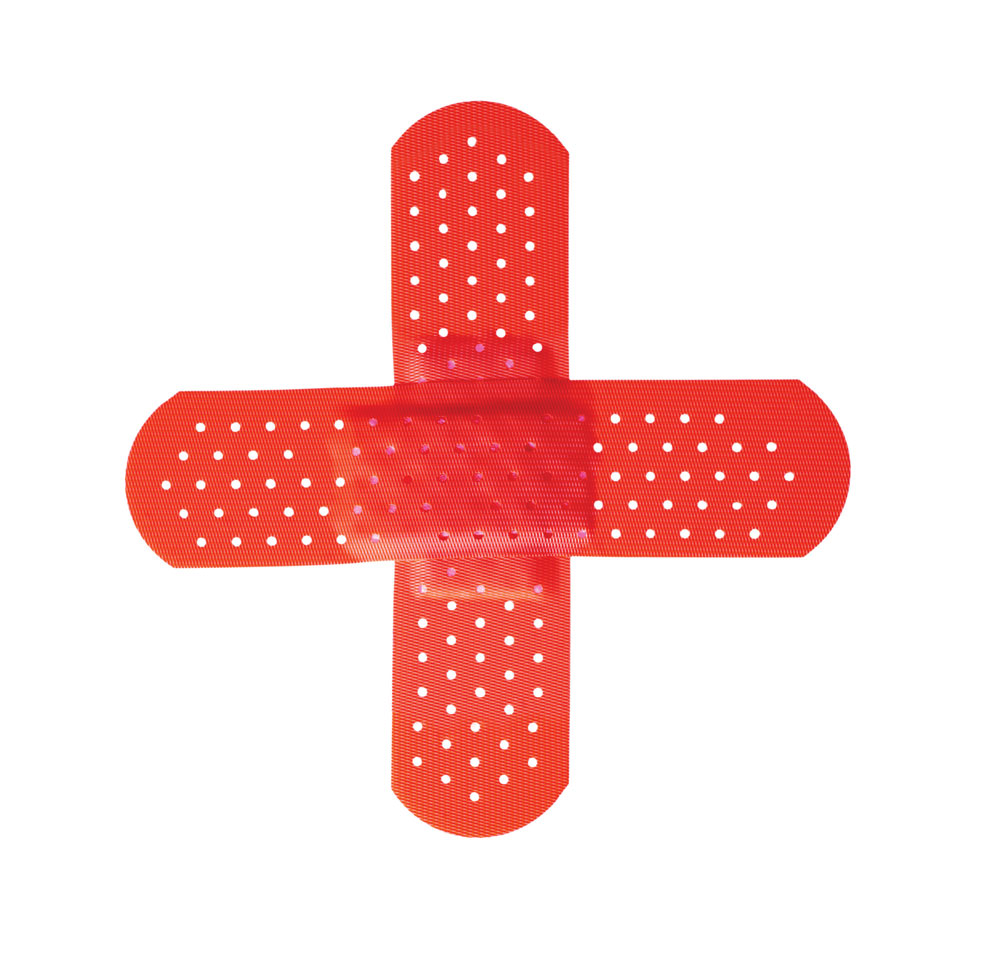 Two red bandaids formed in the shape of the Red Cross.