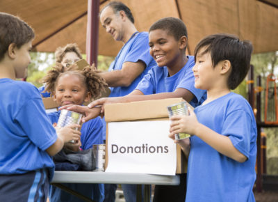 kids helping at a food drive