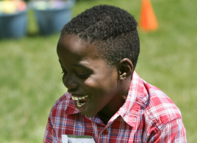 elementary age boy looking joyful