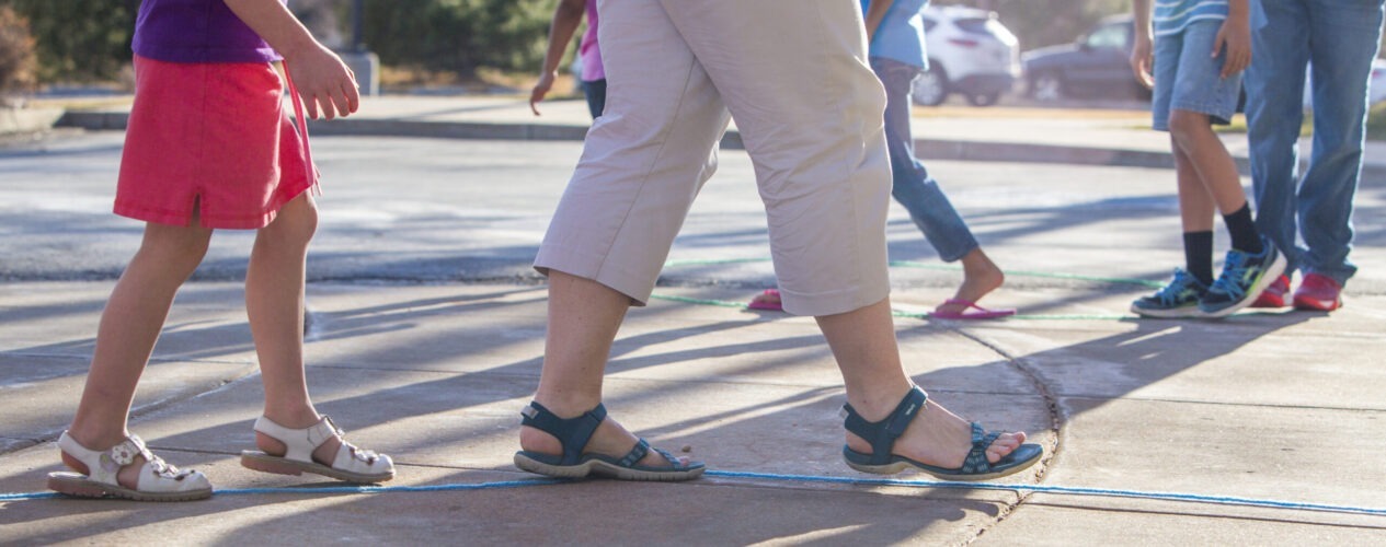 Kids participating in a lesson about Jesus' suffering