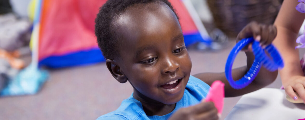 Preschooler learning about how Jesus heals 10 men of leprosy