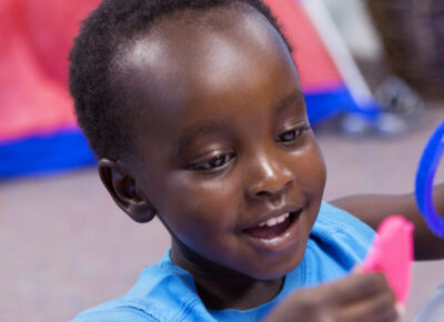 Preschooler learning about how Jesus heals 10 men of leprosy