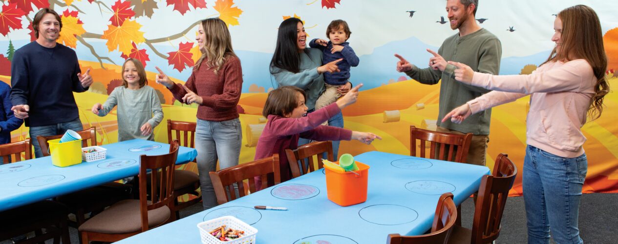 Families at a church fall festival.