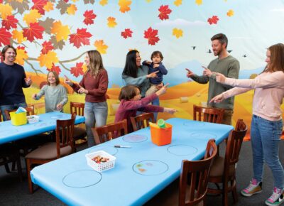 Families at a church fall festival.