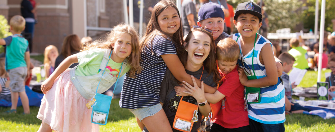 kids and adult showing each other kindness