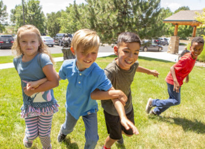 kids playing a fall game outside