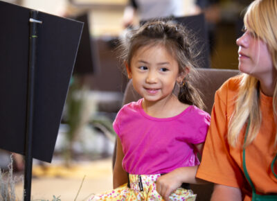 girl sitting in preschool object lesson