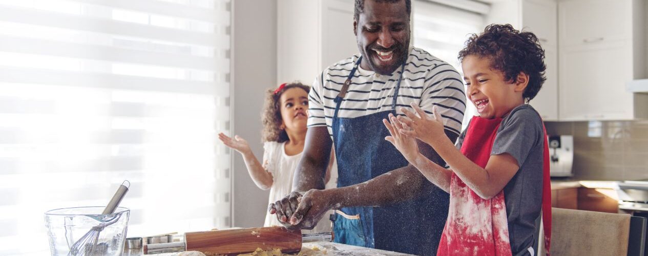 Father and Kids Baking in Kitchen