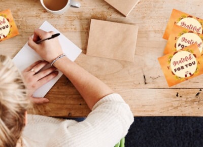 Woman writing thank you cards