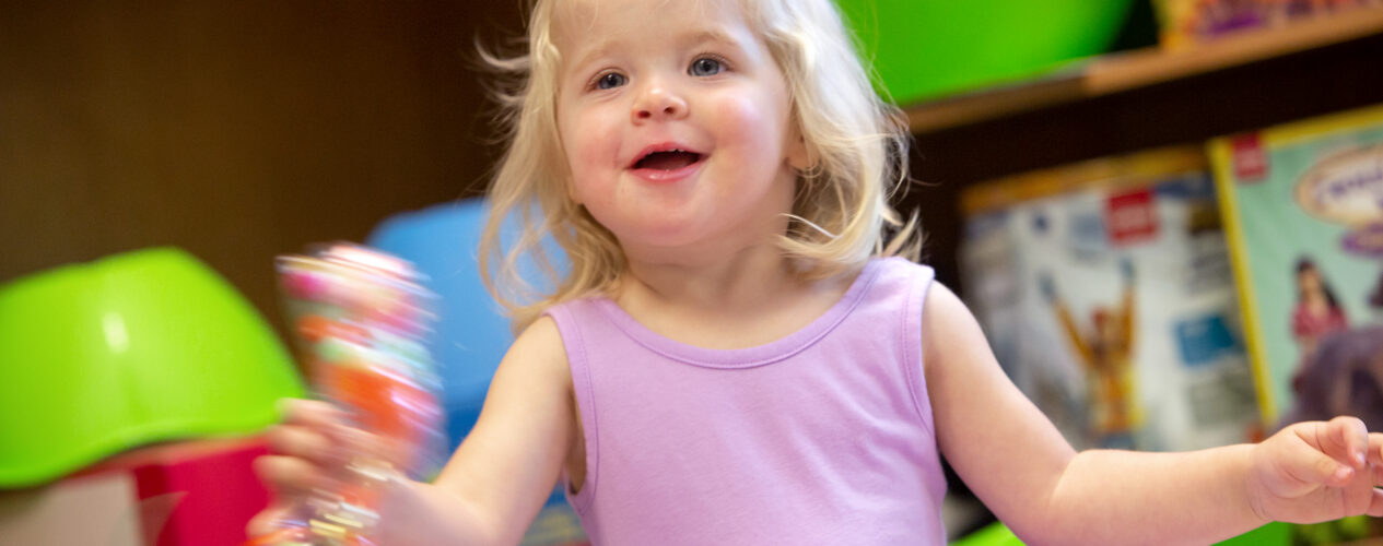 Baby celebrating that Jesus sets us free during a nursery activity for Easter