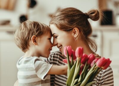Mom smiling because her church used these 5 easy Mother's Day activities inspired by Pinterest.