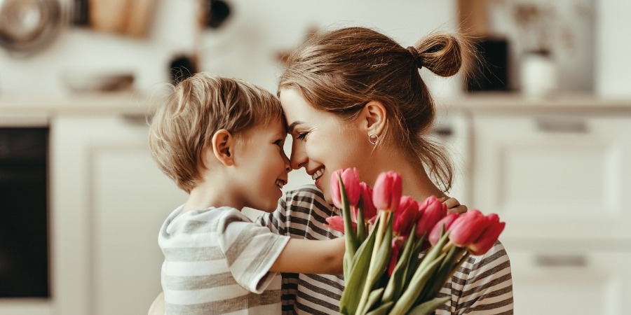 Mom smiling because her church used these 5 easy Mother's Day activities inspired by Pinterest.