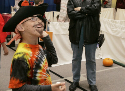 elementary boy playing a Kid’s Ministry Elementary Halloween game