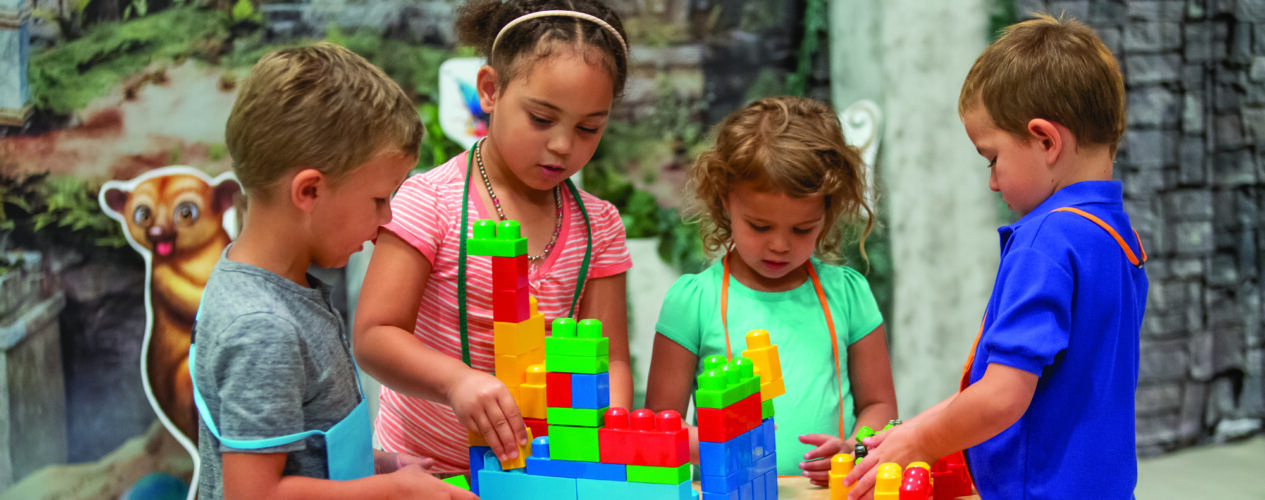 kids in children's ministry paying attention to building Legos