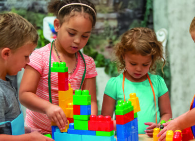 kids in children's ministry paying attention to building Legos