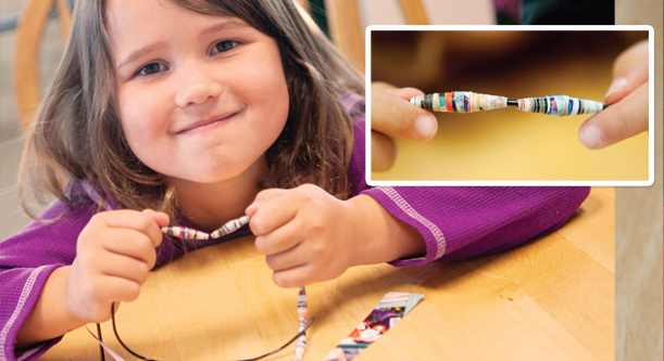 A child making a piece of a jewelry. 
